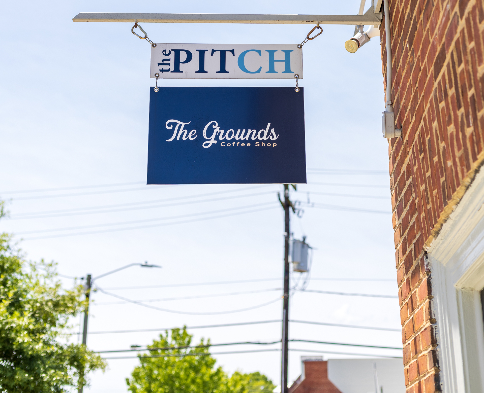 The Grounds storefront sign on West Franklin Street in Chapel Hill